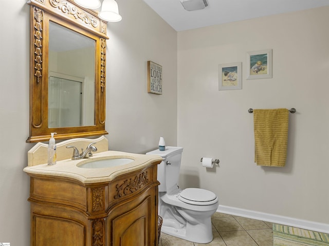 112 Scruggs Ln, Gaffney, SC 29341 - bathroom with toilet, tile patterned flooring, vanity, and baseboards