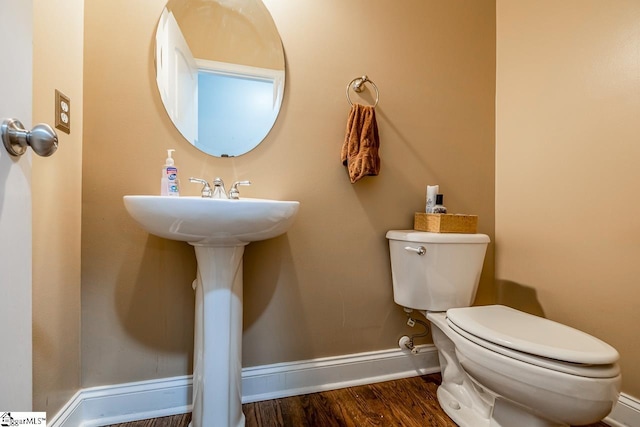 414 Mayburgh Ct, Spartanburg, SC 29301 - bathroom with toilet, wood finished floors, and baseboards
