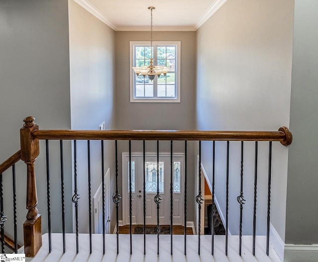 414 Mayburgh Ct, Spartanburg, SC 29301 - stairs featuring a chandelier, crown molding, and baseboards