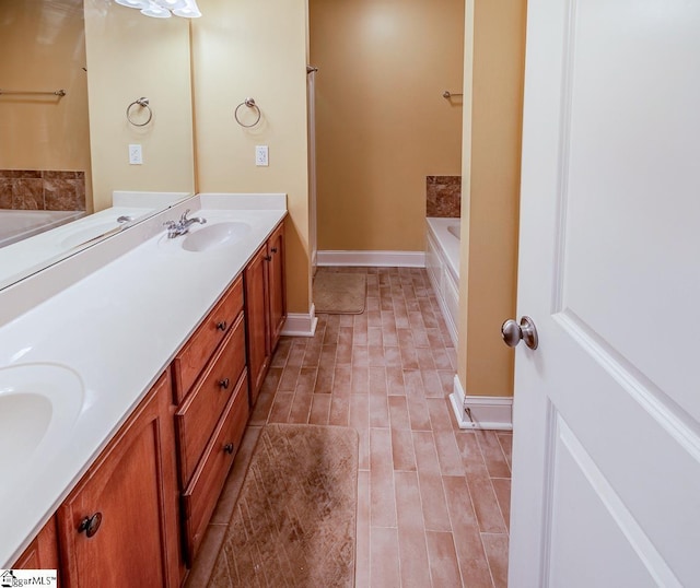 414 Mayburgh Ct, Spartanburg, SC 29301 - full bath featuring double vanity, a garden tub, and baseboards
