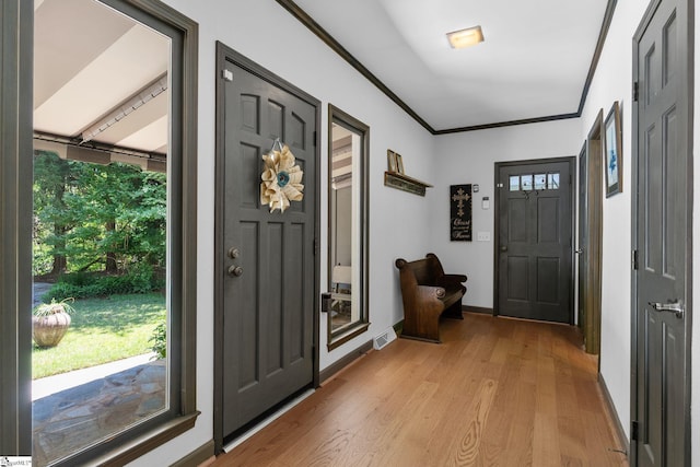 212 Middleton Shores Dr, Anderson, SC 29621 - foyer entrance featuring light wood-style flooring, healthy amount of natural light, crown molding, and baseboards