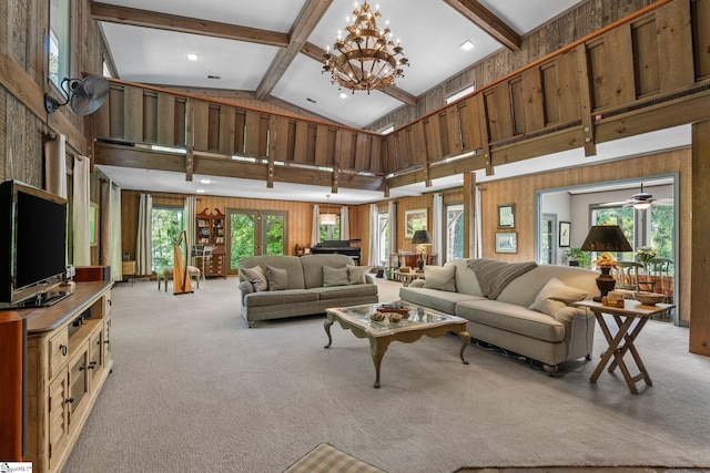 212 Middleton Shores Dr, Anderson, SC 29621 - living area with light carpet, beam ceiling, plenty of natural light, a chandelier, and high vaulted ceiling
