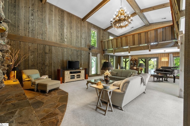 212 Middleton Shores Dr, Anderson, SC 29621 - living area with high vaulted ceiling, plenty of natural light, a chandelier, wooden walls, and beamed ceiling