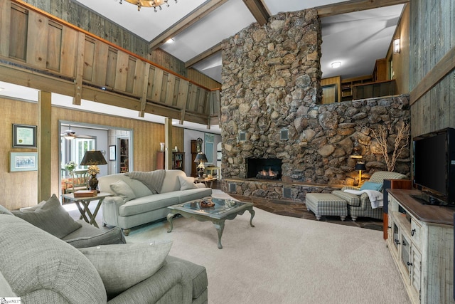 212 Middleton Shores Dr, Anderson, SC 29621 - living room featuring carpet, a stone fireplace, beamed ceiling, high vaulted ceiling, and a ceiling fan