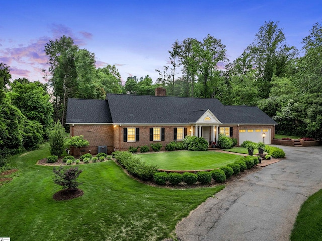 1076 Woodburn Rd, Spartanburg, SC 29302 - view of front of property featuring driveway, a garage, brick siding, a front yard, and a chimney