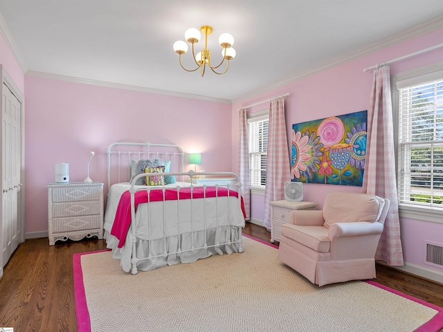 1076 Woodburn Rd, Spartanburg, SC 29302 - bedroom featuring a chandelier, wood finished floors, ornamental molding, and baseboards
