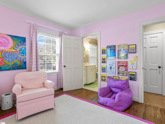 1076 Woodburn Rd, Spartanburg, SC 29302 - living area featuring wood finished floors and crown molding