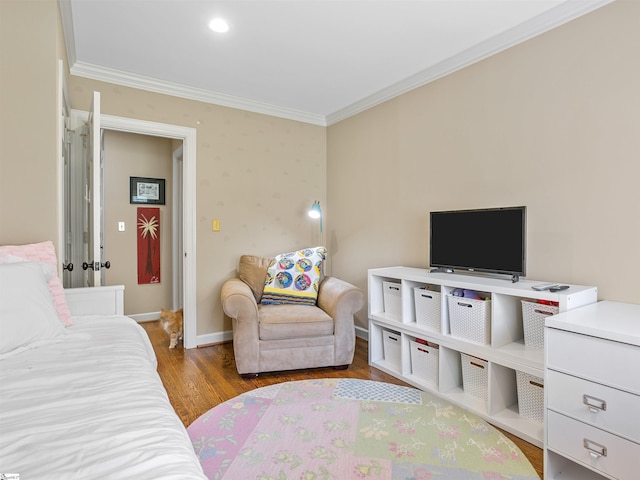 1076 Woodburn Rd, Spartanburg, SC 29302 - living room featuring crown molding, wood finished floors, and baseboards