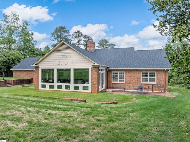 1076 Woodburn Rd, Spartanburg, SC 29302 - rear view of property with brick siding, a chimney, a lawn, and roof with shingles