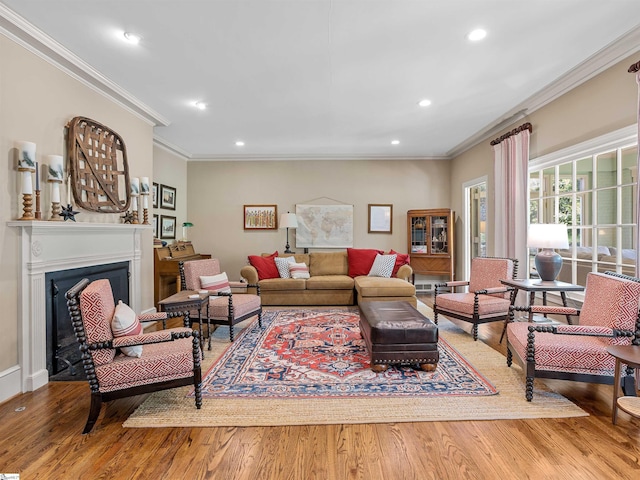 1076 Woodburn Rd, Spartanburg, SC 29302 - living room with crown molding, wood finished floors, recessed lighting, and a fireplace