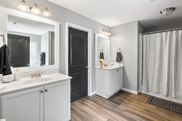 45 Lake Harbor Ct, Greer, SC 29651 - full bathroom with vanity, wood finished floors, and baseboards