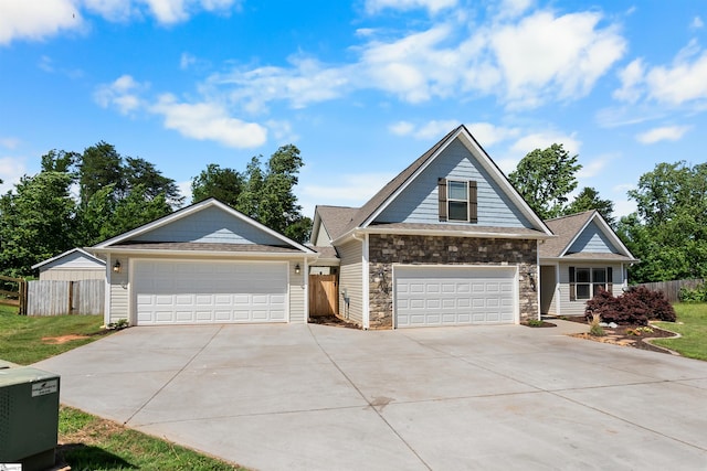 45 Lake Harbor Ct, Greer, SC 29651 - view of front of house featuring stone siding and a detached garage