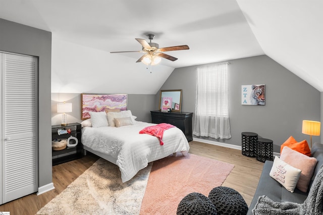 45 Lake Harbor Ct, Greer, SC 29651 - bedroom featuring wood finished floors, lofted ceiling, ceiling fan, a closet, and baseboards