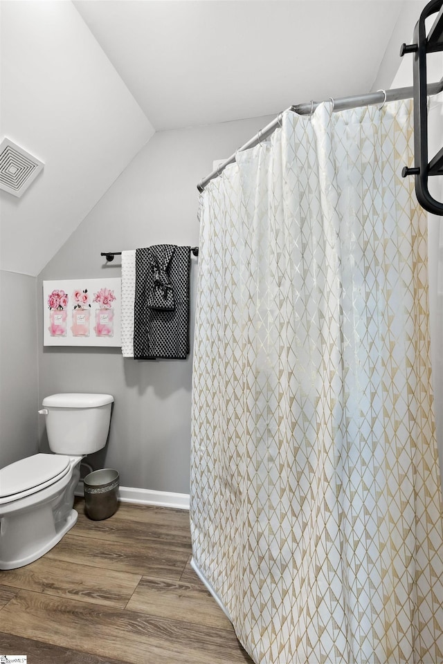 45 Lake Harbor Ct, Greer, SC 29651 - bathroom with toilet, wood finished floors, lofted ceiling, and a shower with curtain