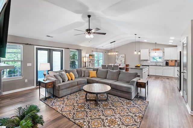 45 Lake Harbor Ct, Greer, SC 29651 - living room featuring vaulted ceiling, wood finished floors, a ceiling fan, baseboards, and recessed lighting