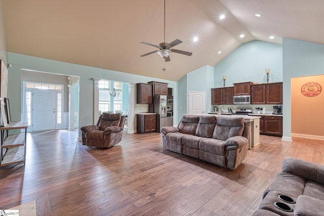 202 Buxton Ct, Easley, SC 29642 - living room with high vaulted ceiling, light wood-style flooring, a ceiling fan, baseboards, and recessed lighting