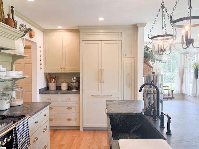 6050 Cross Anchor Rd, Enoree, SC 29335 - kitchen with a sink, backsplash, a chandelier, light wood finished floors, and recessed lighting