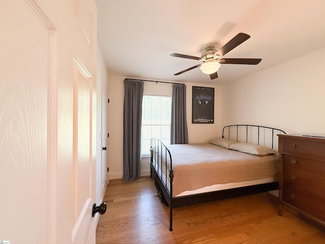 6050 Cross Anchor Rd, Enoree, SC 29335 - bedroom with light wood-style flooring and ceiling fan