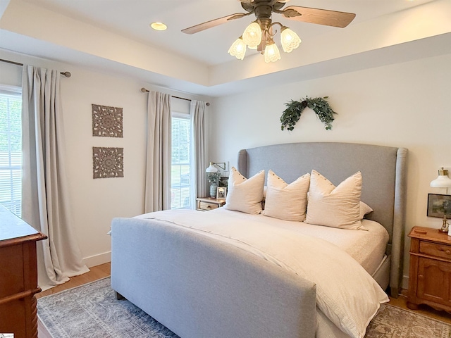 6050 Cross Anchor Rd, Enoree, SC 29335 - bedroom with multiple windows, wood finished floors, a ceiling fan, and recessed lighting