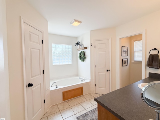 6050 Cross Anchor Rd, Enoree, SC 29335 - full bath featuring a garden tub, vanity, and tile patterned floors