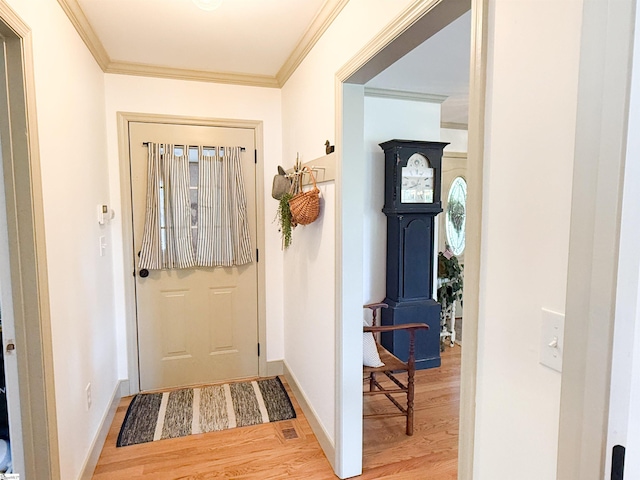 6050 Cross Anchor Rd, Enoree, SC 29335 - entrance foyer with light wood-type flooring, crown molding, and baseboards