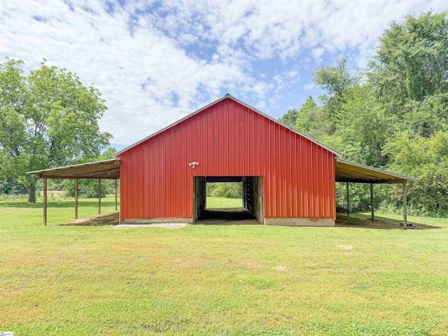 6050 Cross Anchor Rd, Enoree, SC 29335 - view of pole building featuring a lawn