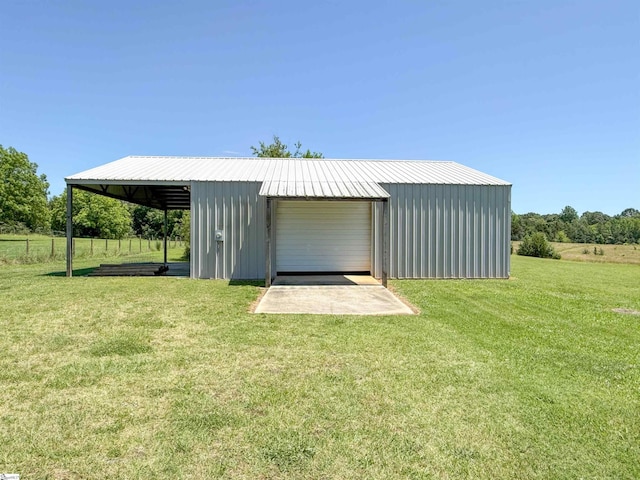6050 Cross Anchor Rd, Enoree, SC 29335 - view of pole building with a yard