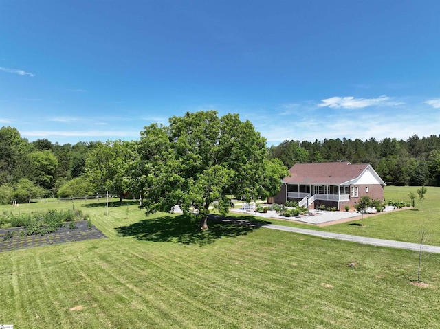 6050 Cross Anchor Rd, Enoree, SC 29335 - view of green lawn with covered porch