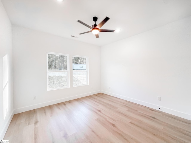 1623 Fairfield Rd, Chesnee, SC 29323 - unfurnished room with light wood-style flooring, a ceiling fan, and baseboards