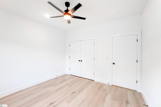 1623 Fairfield Rd, Chesnee, SC 29323 - unfurnished bedroom with light wood-style flooring, baseboards, a closet, and ceiling fan