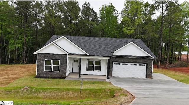 136 Susans Rd, Gaffney, SC 29341 - modern farmhouse style home with stone siding, a porch, a garage, driveway, and roof with shingles
