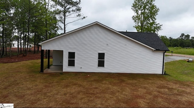 136 Susans Rd, Gaffney, SC 29341 - back of house featuring a yard and roof with shingles