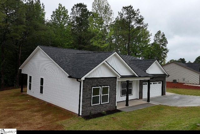 136 Susans Rd, Gaffney, SC 29341 - modern farmhouse style home featuring a garage, a shingled roof, driveway, stone siding, and a front yard