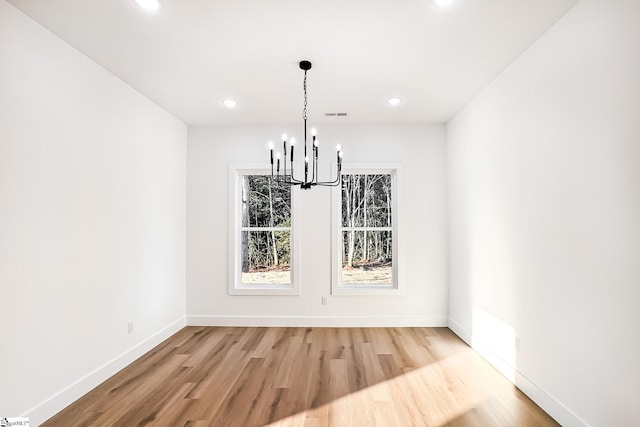 136 Susans Rd, Gaffney, SC 29341 - unfurnished dining area with light wood finished floors, a chandelier, recessed lighting, baseboards, and healthy amount of natural light