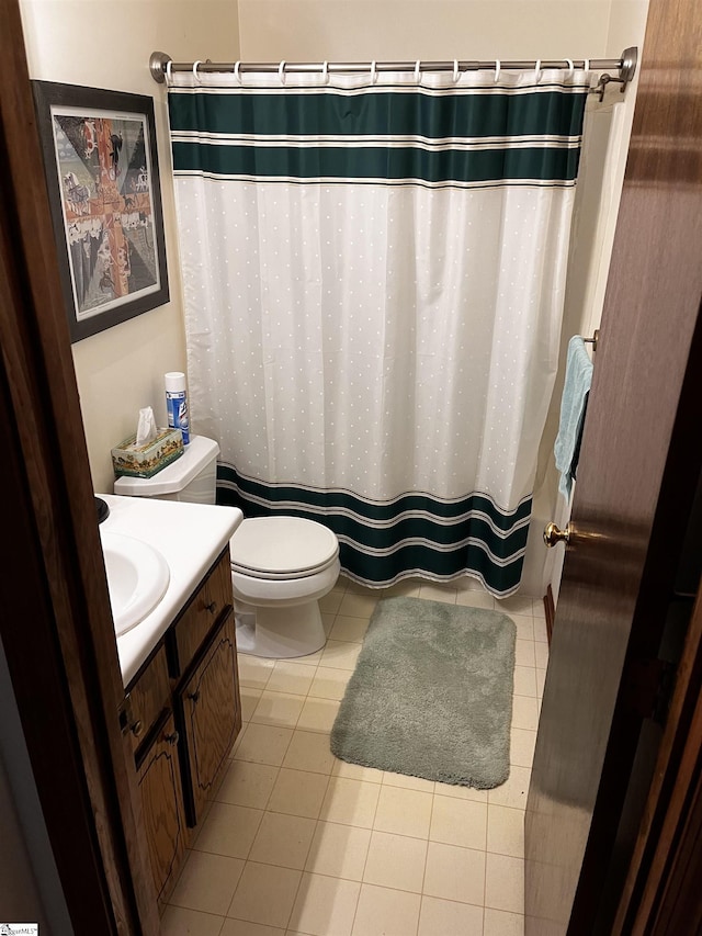 106 Stonegate Ct, Simpsonville, SC 29681 - full bath featuring toilet, vanity, tile patterned floors, and a shower with shower curtain