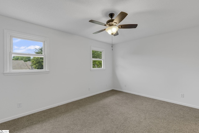528 Market St, Spartanburg, SC 29301 - empty room featuring a ceiling fan, baseboards, and carpet