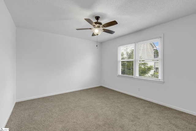 528 Market St, Spartanburg, SC 29301 - carpeted spare room featuring a ceiling fan, a textured ceiling, and baseboards