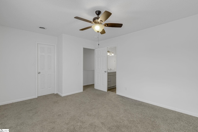 528 Market St, Spartanburg, SC 29301 - unfurnished bedroom with carpet floors, baseboards, and connected bathroom