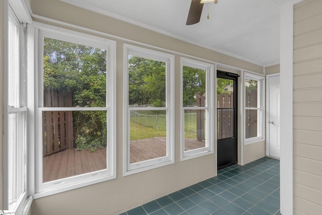 528 Market St, Spartanburg, SC 29301 - unfurnished sunroom with tile patterned flooring and crown molding