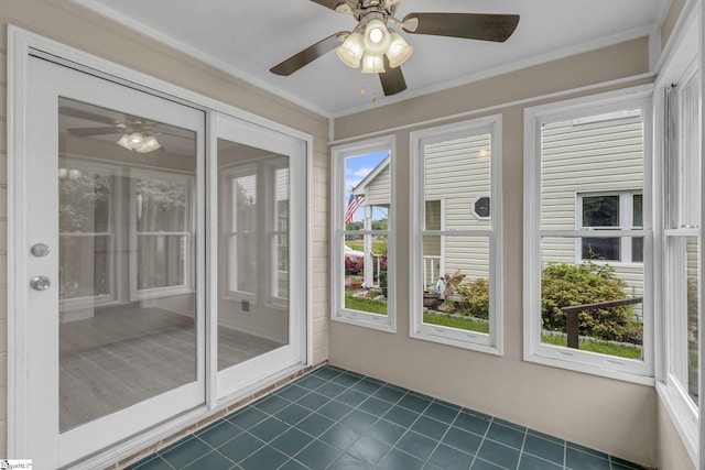 528 Market St, Spartanburg, SC 29301 - unfurnished sunroom with ceiling fan, tile patterned flooring, and crown molding