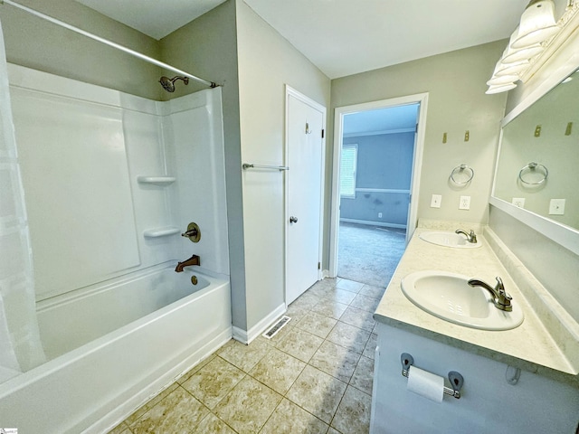 203 Arlington Rd, Greer, SC 29651 - full bath featuring shower / bathtub combination, tile patterned floors, double vanity, and baseboards