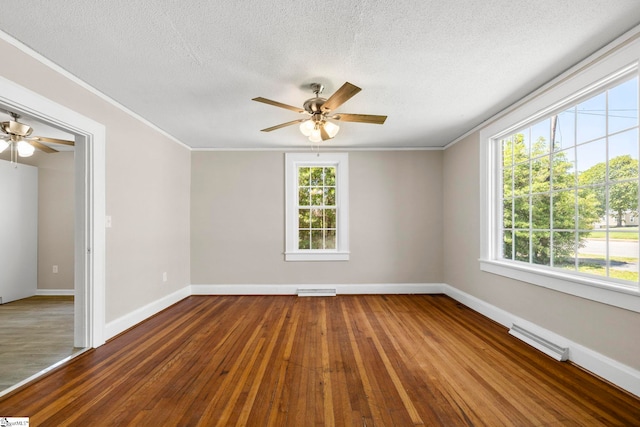 202 E Green St, Iva, SC 29655 - spare room with ceiling fan, hardwood / wood-style floors, baseboards, crown molding, and plenty of natural light