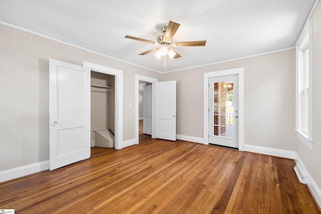202 E Green St, Iva, SC 29655 - unfurnished bedroom with light wood-type flooring, baseboards, crown molding, and a ceiling fan