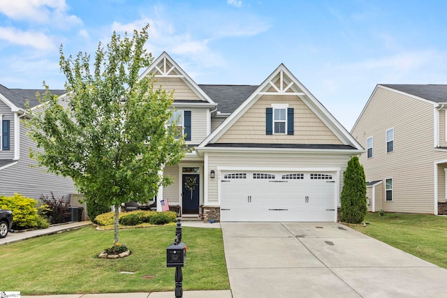 311 Sandusky Ln, Simpsonville, SC 29680 - craftsman house with a front lawn, concrete driveway, and a garage