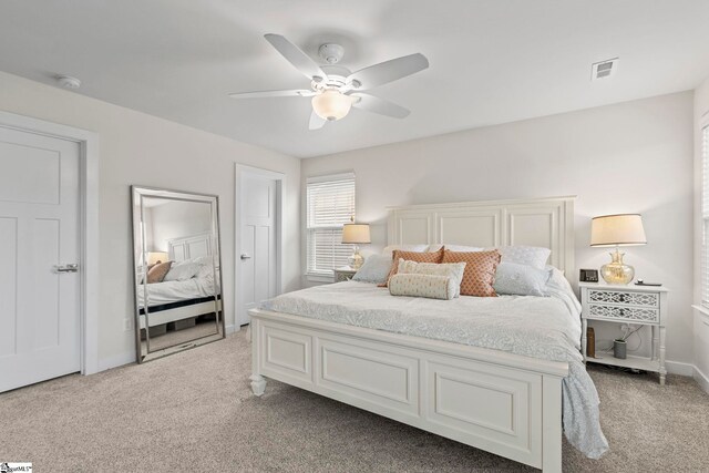 311 Sandusky Ln, Simpsonville, SC 29680 - bedroom with light carpet, ceiling fan, and baseboards