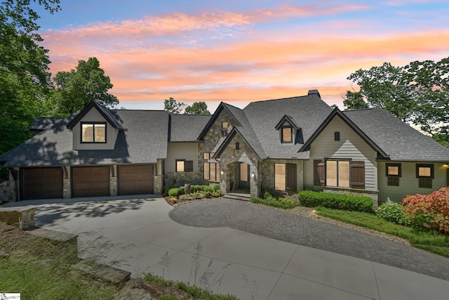 1110 Mountain Summit Rd, Travelers Rest, SC 29690 - view of front facade with stone siding, concrete driveway, and roof with shingles