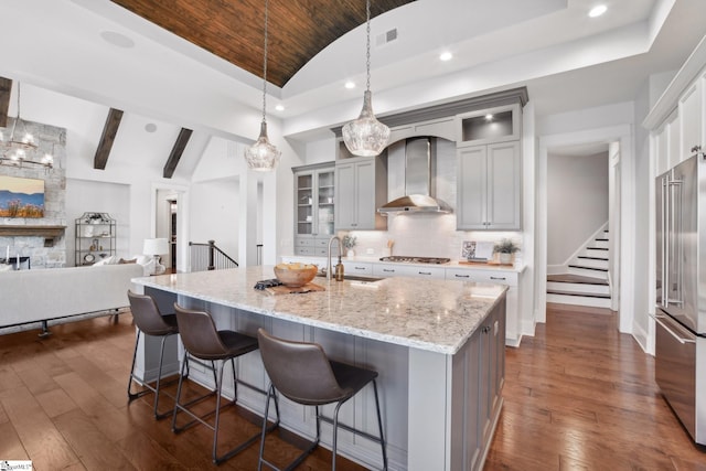 1110 Mountain Summit Rd, Travelers Rest, SC 29690 - kitchen featuring vaulted ceiling, wall chimney exhaust hood, a sink, wooden ceiling, and gray cabinetry