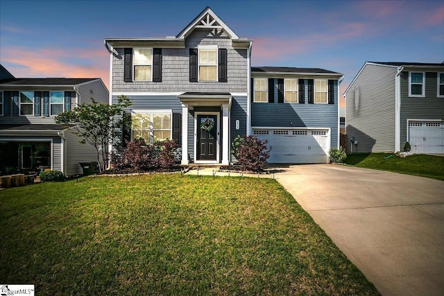 275 Ralston Rd, Greer, SC 29651 - view of front of house featuring concrete driveway, an attached garage, and a lawn