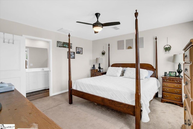 275 Ralston Rd, Greer, SC 29651 - bedroom featuring light colored carpet, ensuite bath, a ceiling fan, and baseboards