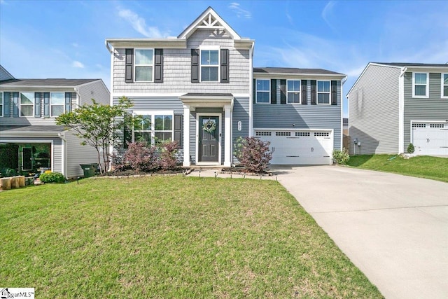 275 Ralston Rd, Greer, SC 29651 - view of front facade with concrete driveway, an attached garage, and a front yard